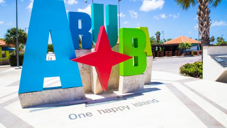 A stock photo of an Aruba tourism sign