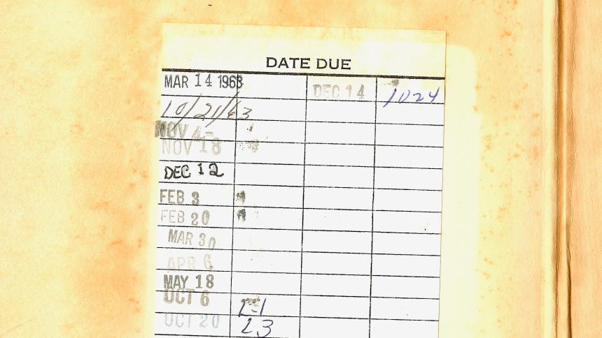 A stock photo of a library check in card