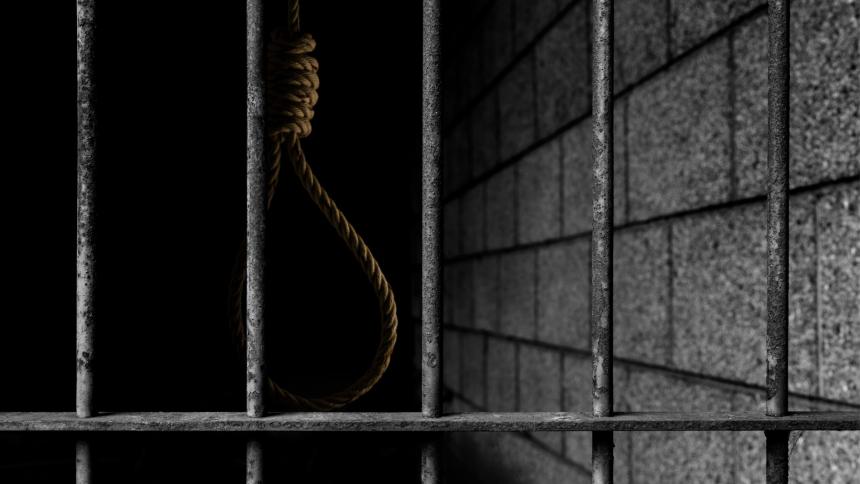 A stock image showing prison bars and a noose 