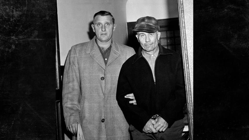 Waushara County Sheriff Art Schley (left) escorts Edward Gein (right) into Central State Hospital on the 23rd November,1957, in Milwaukee, USA.