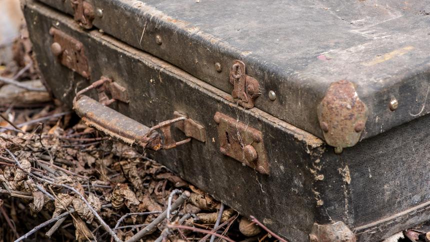 A rusty old suitcase