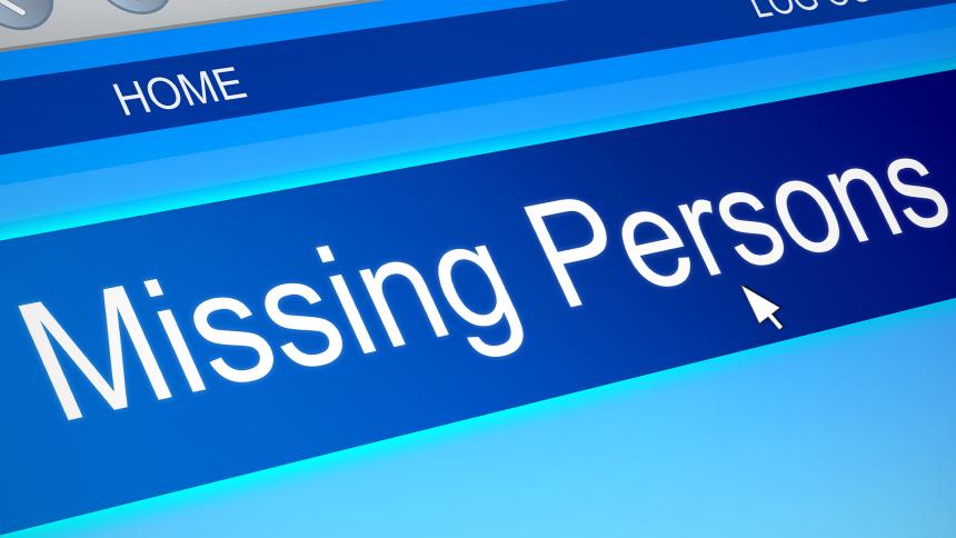 A cursor hovering over a 'Missing Persons' banner on a web page