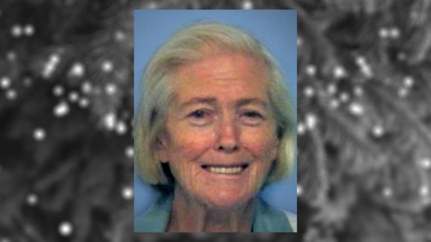 Police mugshot of Janie Lou Gibbs overlayed on a blurred, black and white image of a Christmas tree