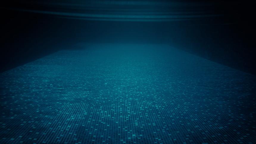 Underwater in a dark swimming pool