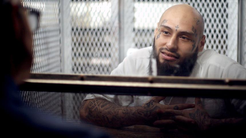 Benjamin Delgadillo being interviewed in prison
