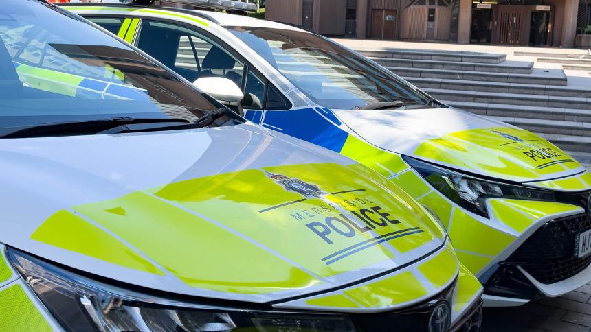 Two Merseyside Police cars